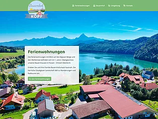 Website eines Ferienwohnungs-Anbieters mit Luftbild vom Weißensee